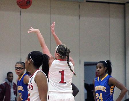 Paige Wright attempts a free throw in today's 74-58 win over No. 10 Monroe College. She had 18 points and 11 rebounds, while being named Tip Off Classic MVP. Photo by Nicholas Huenefeld/Owens Sports Information